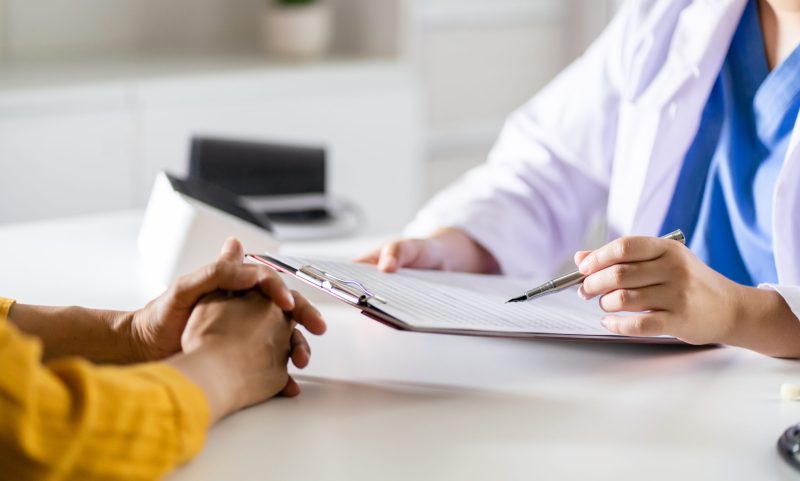 Healthcare. Doctor and patient are discussing interview consulting patient. Professional medical doctor in the hospital. Healthcare and medical